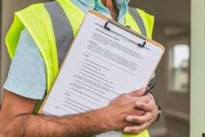person holding clipboard