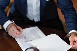 person signing contract